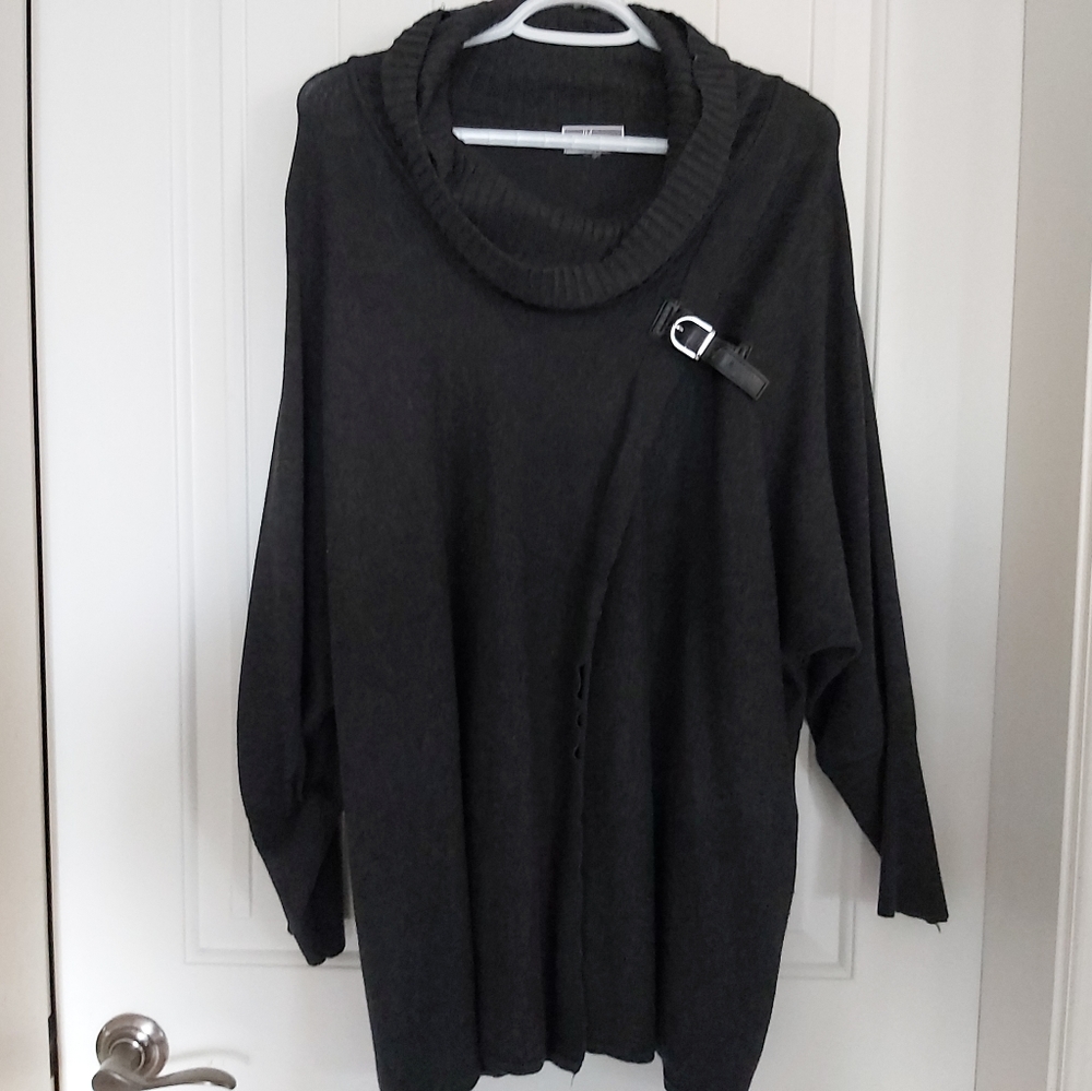 Poncho with buckle